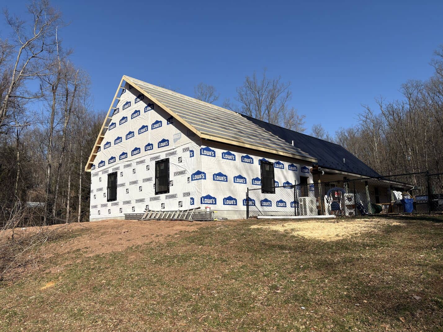 building of an addition to this house is in progress